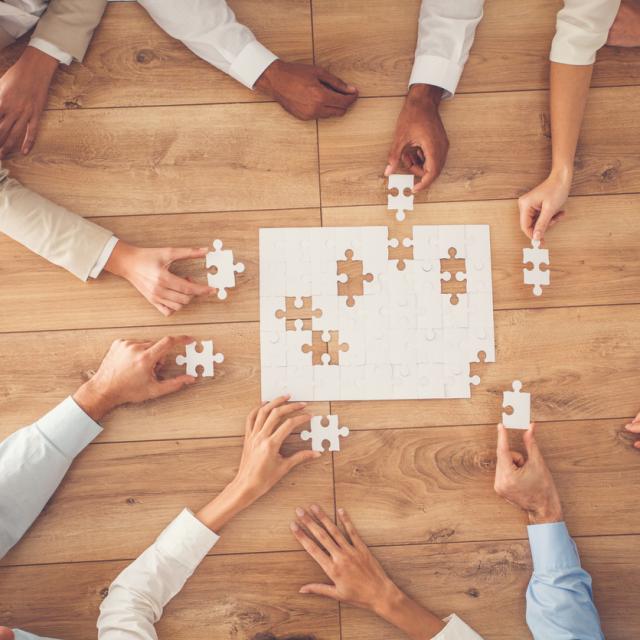 Business people finding solution together